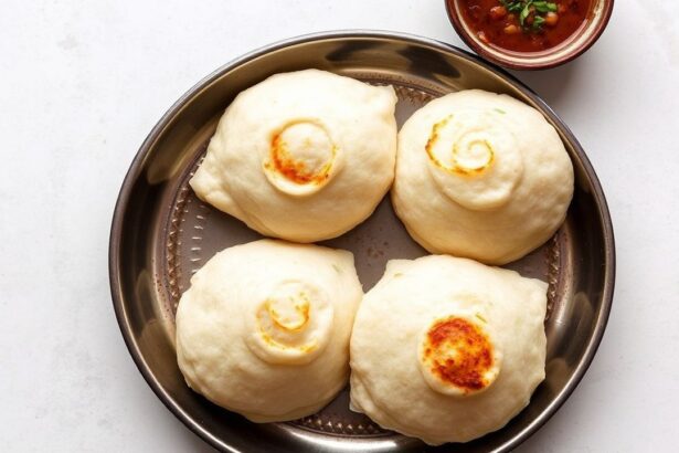 Puffy bhatura golden and puffy, deep-fried with soft interior, crispy outside in a step-by-step guide.
