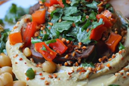 Delectable Layered Hummus Dip with Spiced Beef & Pine Nuts