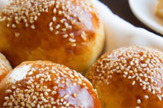 Golden Pan-Fried Sweet Buns Topped with Crunchy Sesame Seeds