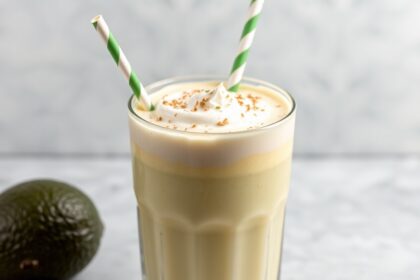 Creamy avocado and condensed milk shake, a sweet delight.
